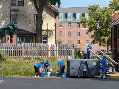 Volunteers cleaning up neighborhood
