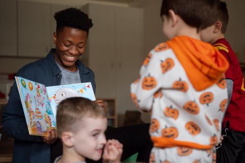 Volunteer reading to kids
