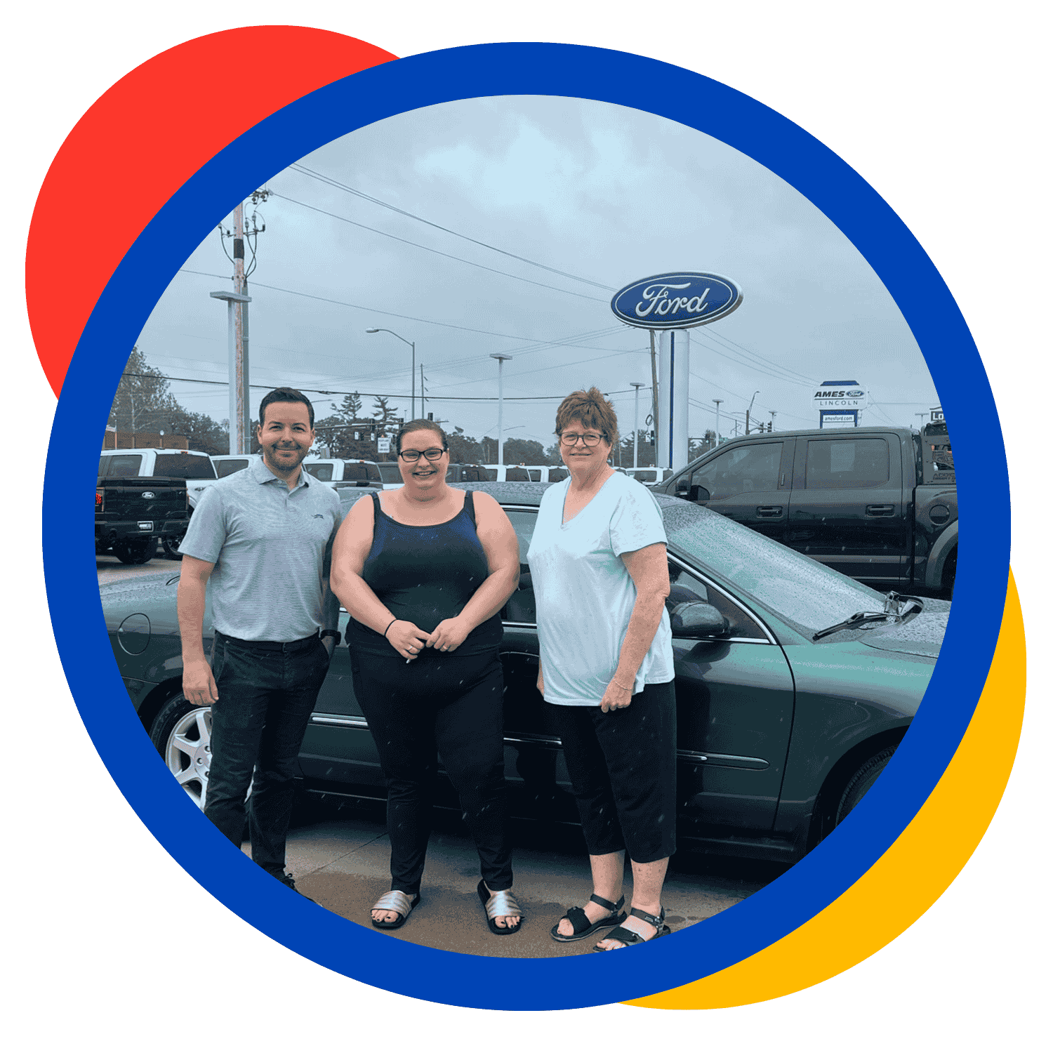 Nick, Emma, and Kris standing in from of Emma's car at Ames Ford Lincoln